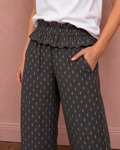 Goldie Elasticated Peplum Waist Barrel Leg Trouser - Dark Charcoal & Gold